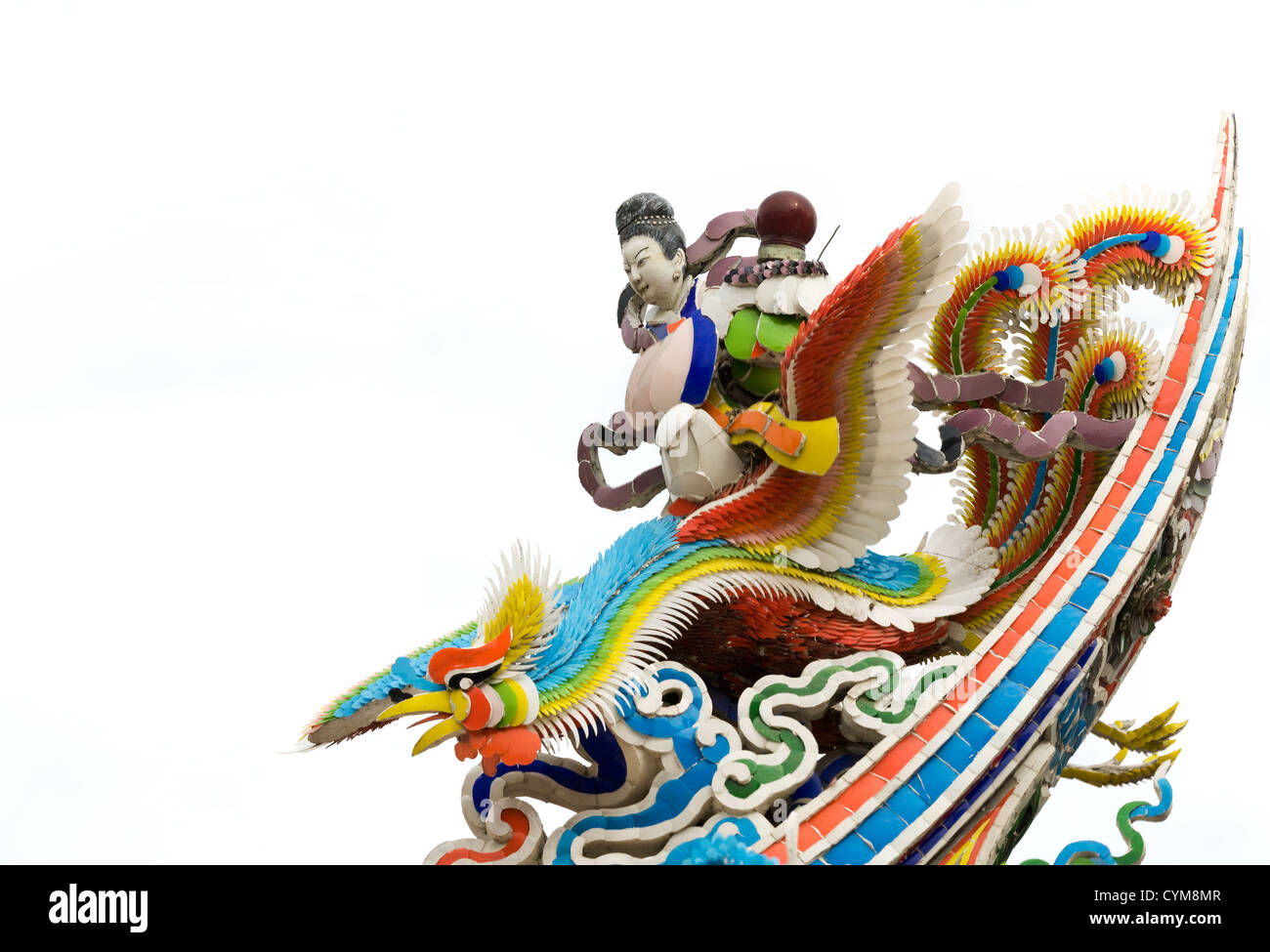 Chinese god statue ride on phoenix on oriental temple roof with white
