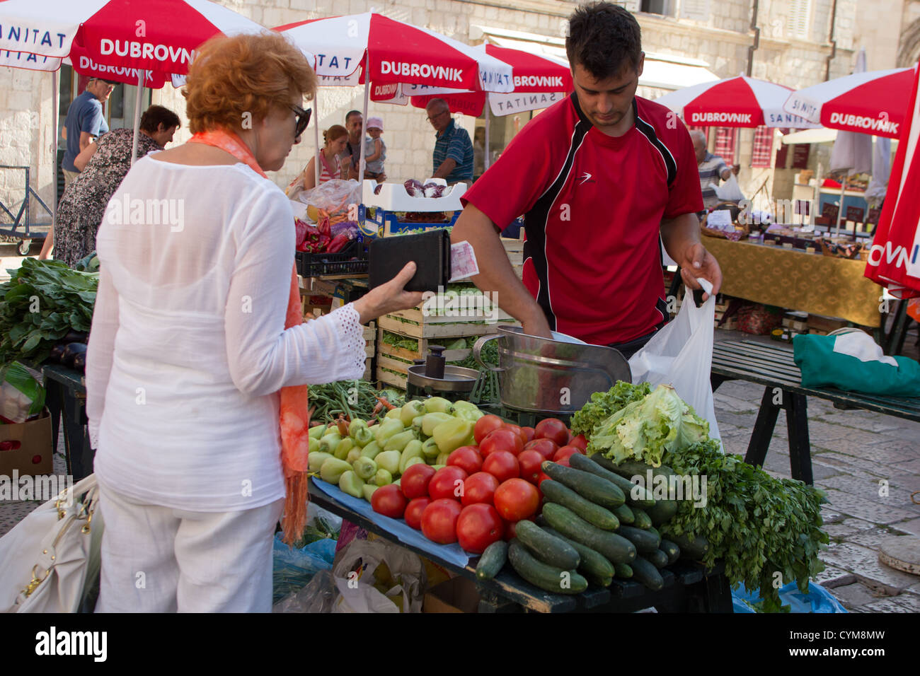 Shoppers in Dubrovnik city market. Croatia Stock Photo