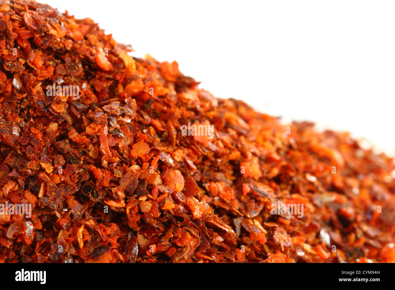 closeup shot of Aleppo Flakes red chillie pepper, soft focus, isolated Stock Photo
