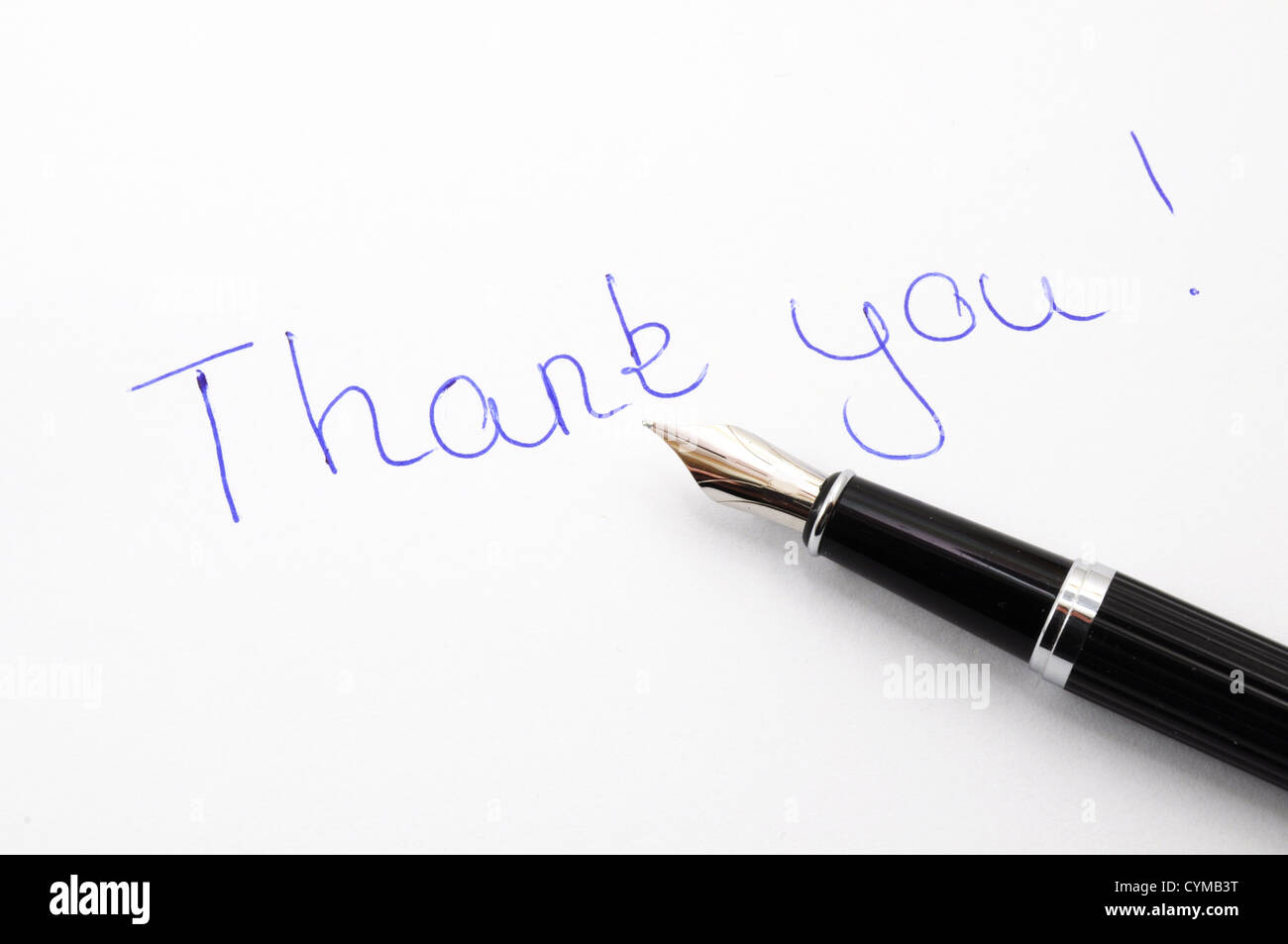 thank you message on paper with pen Stock Photo - Alamy