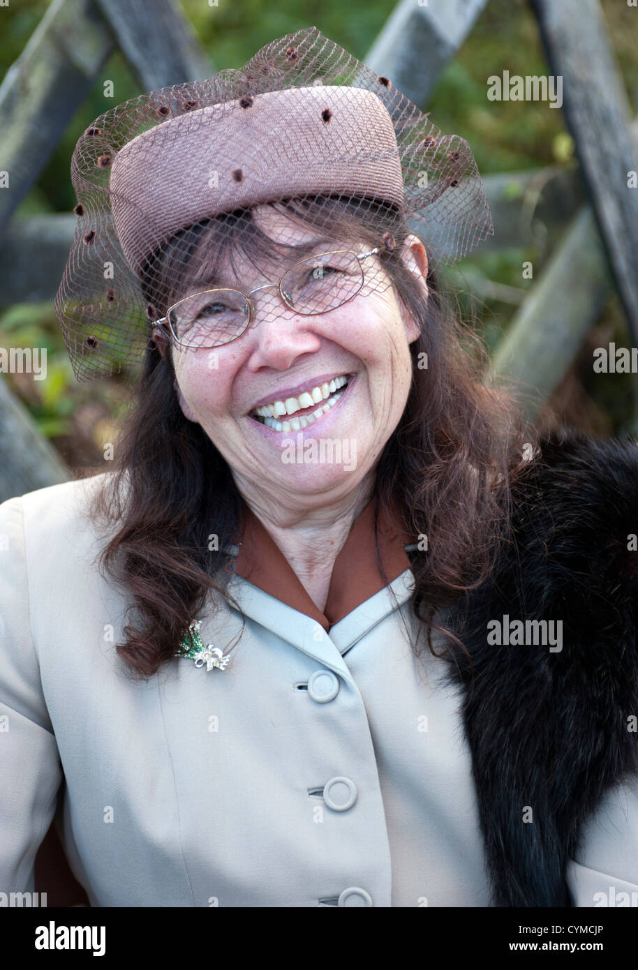 smiling middle aged women in 1940's costume Stock Photo