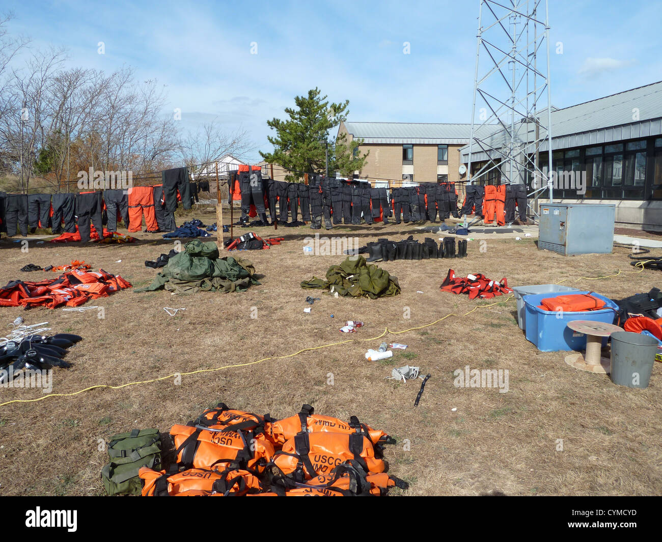 NEW YORK – Rescue and survival clothing and gear saturated from Hurricane Sandy flood waters, hang out to dry at Coast Guard Station Sandy Hook, N.J., one of the units hardest impacted from Hurricane Sandy, Nov. 5, 2012. The gear is vital for the station Stock Photo