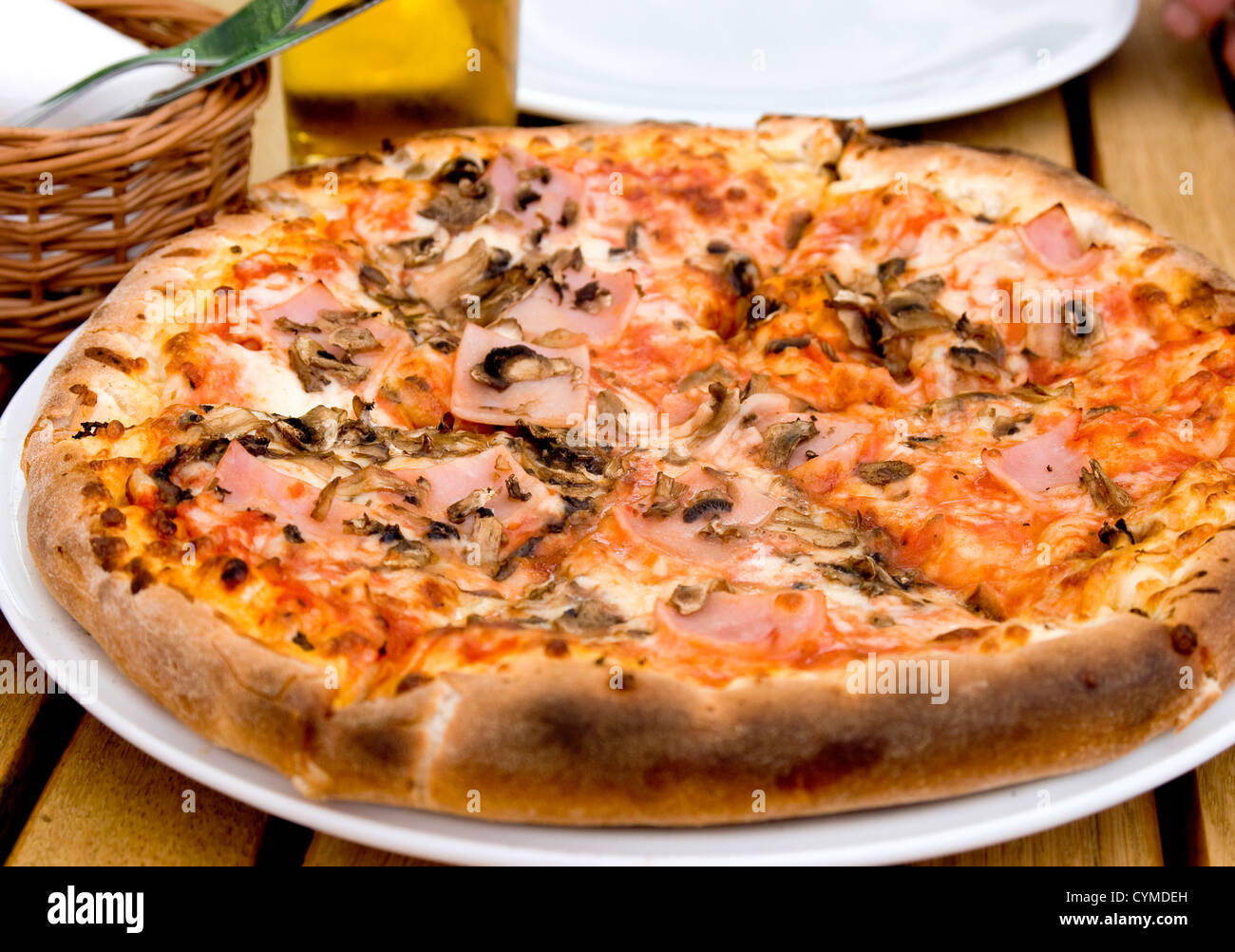pizza on the pizzeria table ready to eat Stock Photo