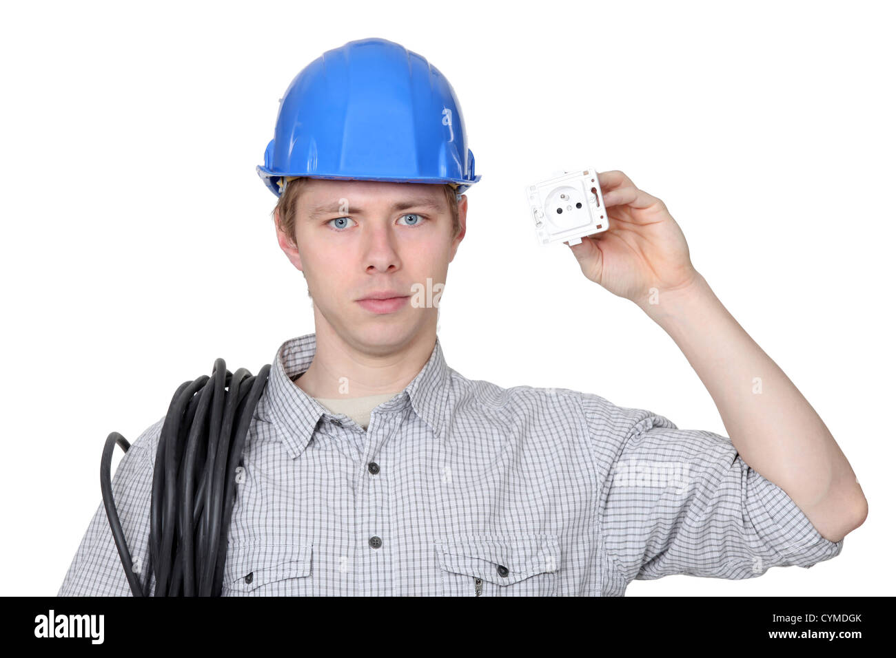 Electrician holding a plug socket Stock Photo