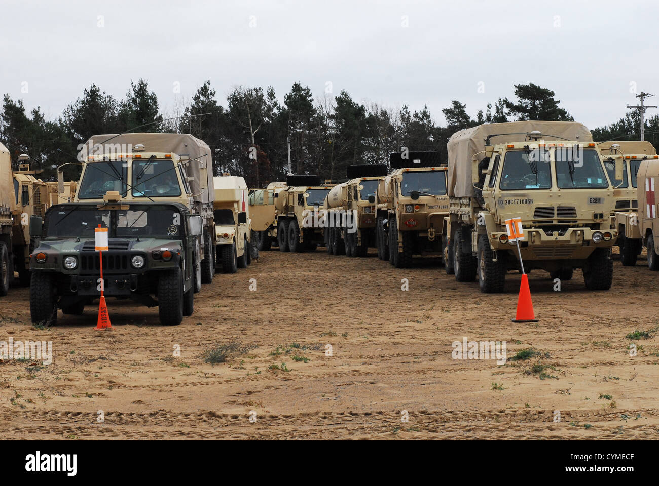 Vehicles from 10th Mountain Division (LI), staged in preparation for support to Hurricane Sandy victims November 4, 2012 on Fort Drum, NY. Stock Photo
