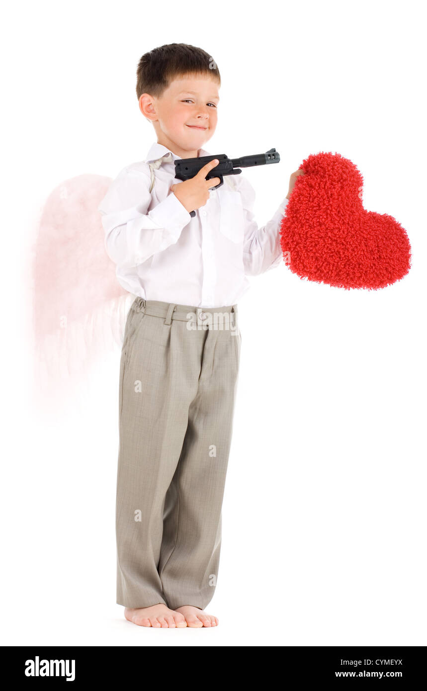 Young cupid going to shoot a red heart Stock Photo