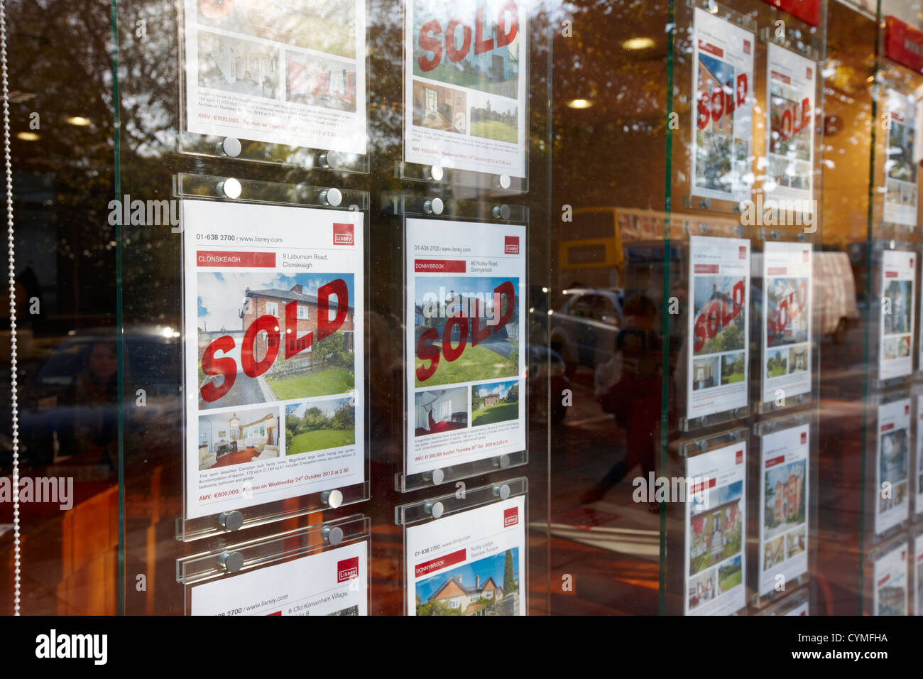 properties marked as sold in an estate agent window in central dublin