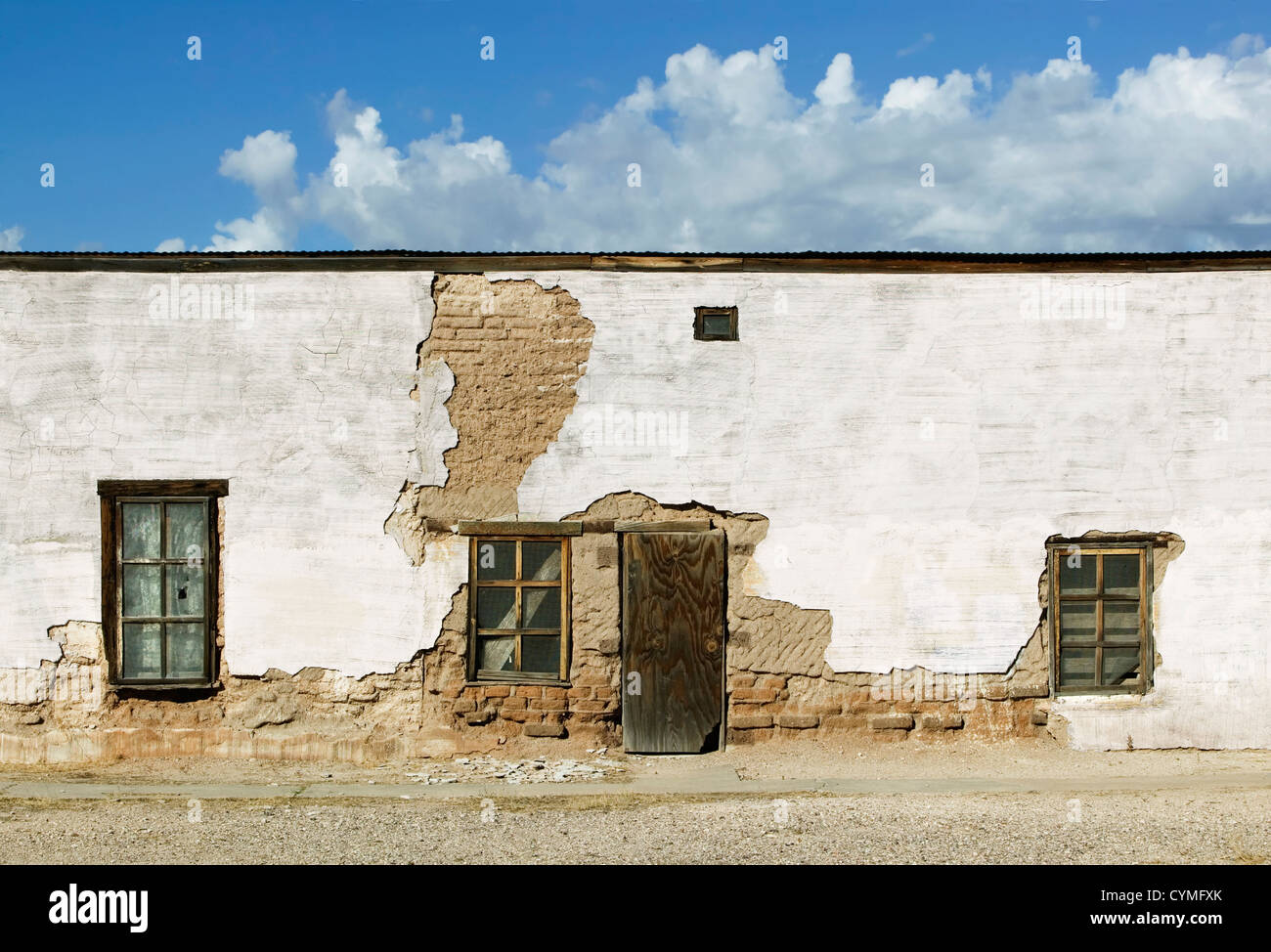 Adobe Building Windows Boarded and abandoned adobe building with a door and windows Stock ...