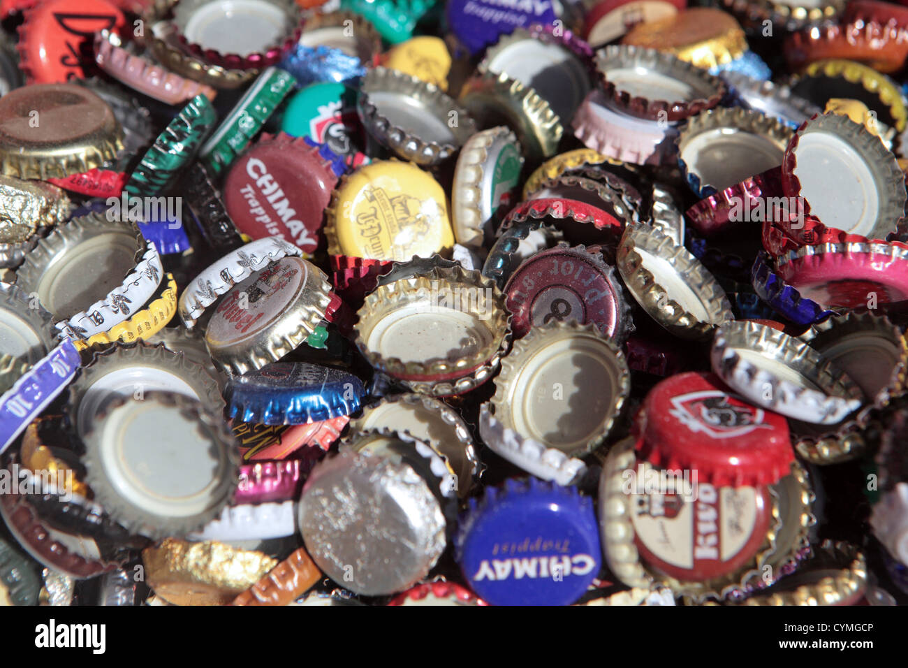 Colorful collection of numerous different beer bottle tops, studio pic. Stock Photo