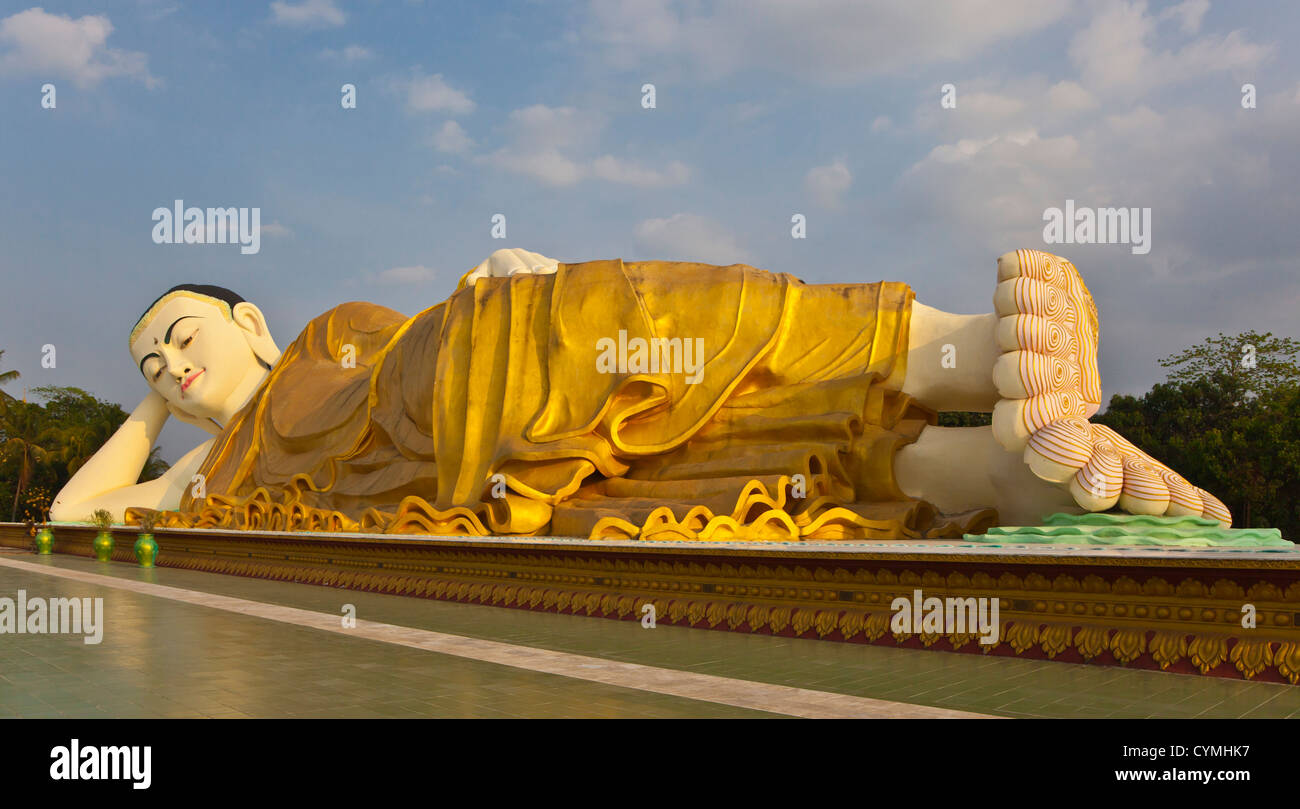 The MYA THA LYAUNG reclining BUDDHA is one of the largest in the world - BAGO, MYANMAR Stock Photo