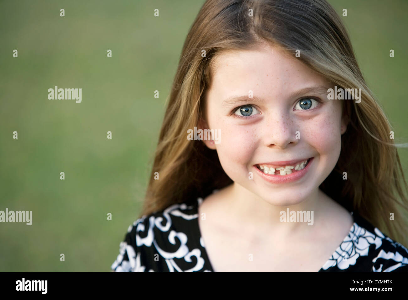 Pretty Young Girl with Freckles and a Big Smile and Crooked Teeth ...