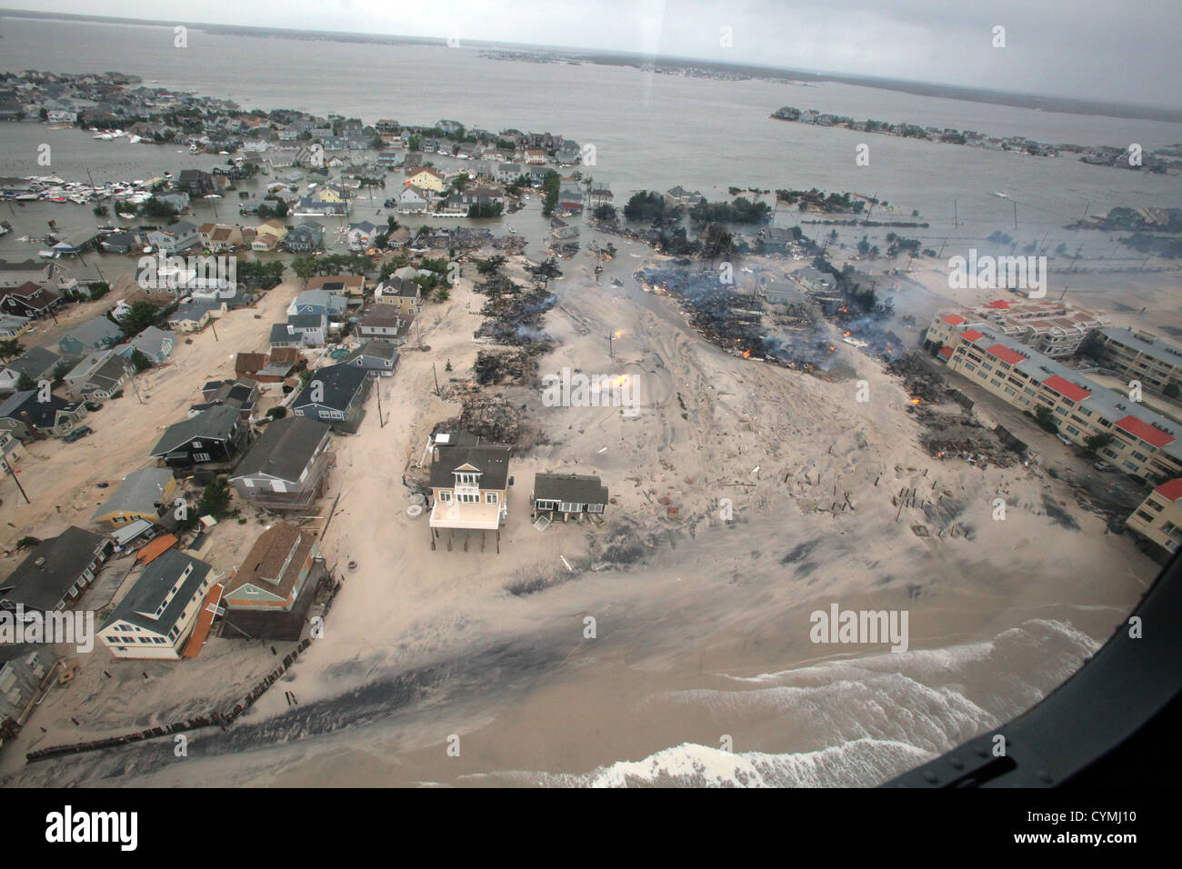 Aerial views of the damage caused by Hurricane Sandy to the New Jersey coast taken during a search and rescue mission by 1-150 Assault Helicopter Battalion, New Jersey Army National Guard, Oct. 30, 2012. (U.S. Air Force photo by Master Sgt. Mark C. Olsen/Released) Stock Photo