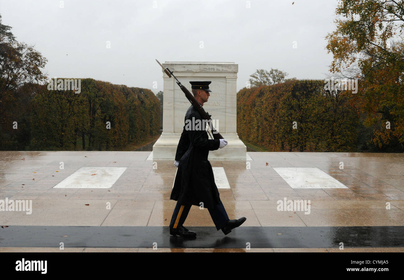 Spc. Brett Hyde, Tomb Sentinel, 3d U.S. Infantry Regiment (The Old Guard), keeps guard over the Tomb of the Unknown Soldier during Hurricane Sandy at Arlington National Cemetery, Va., Oct. 29, 2012. Just like the Sentinel’s Creed says “Through the years of diligence and praise and the discomfort of the elements, I will walk my tour in humble reverence to the best of my ability”, Hyde lives by this creed. (U.S. Army Photo by Sgt. Jose A. Torres Jr.) Stock Photo