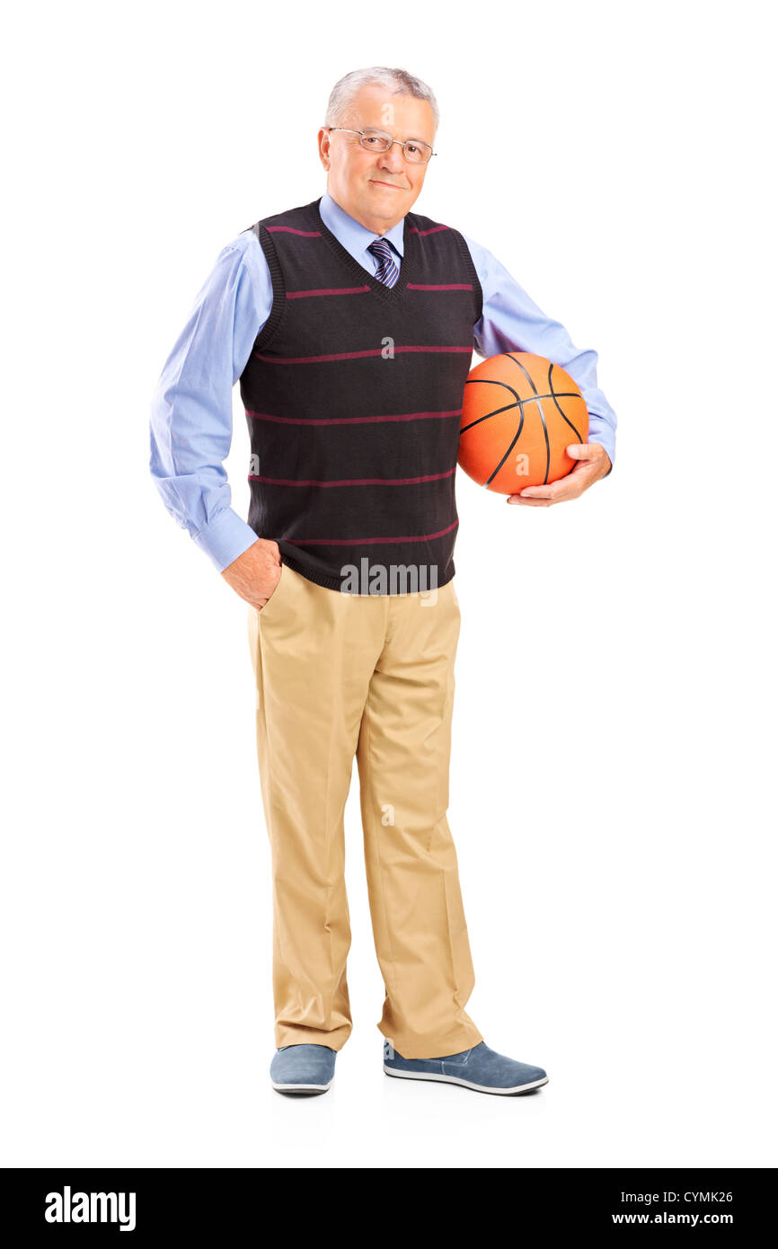 Full length portrait of a gentleman holding a basketball isolated