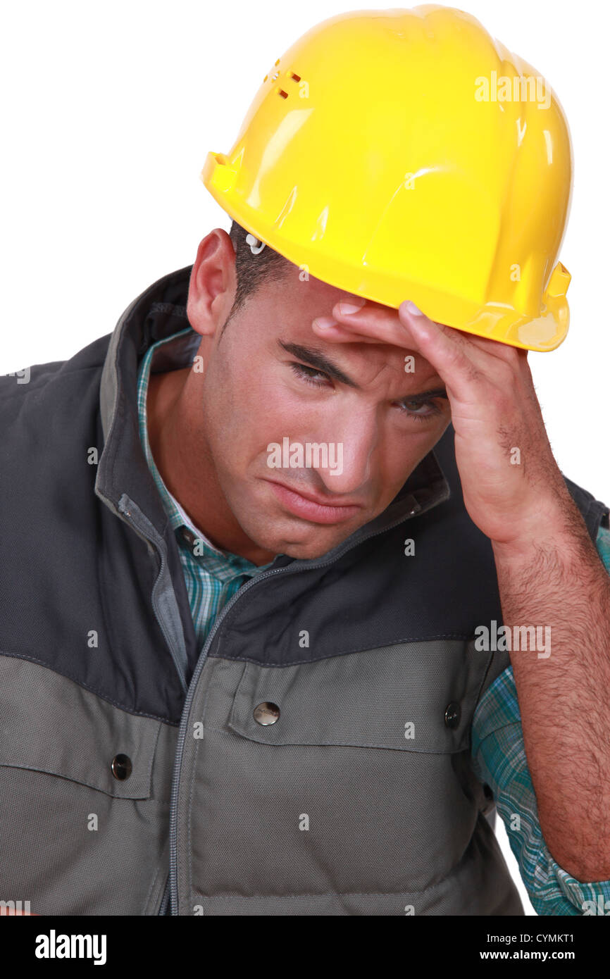 Crying construction worker Stock Photo