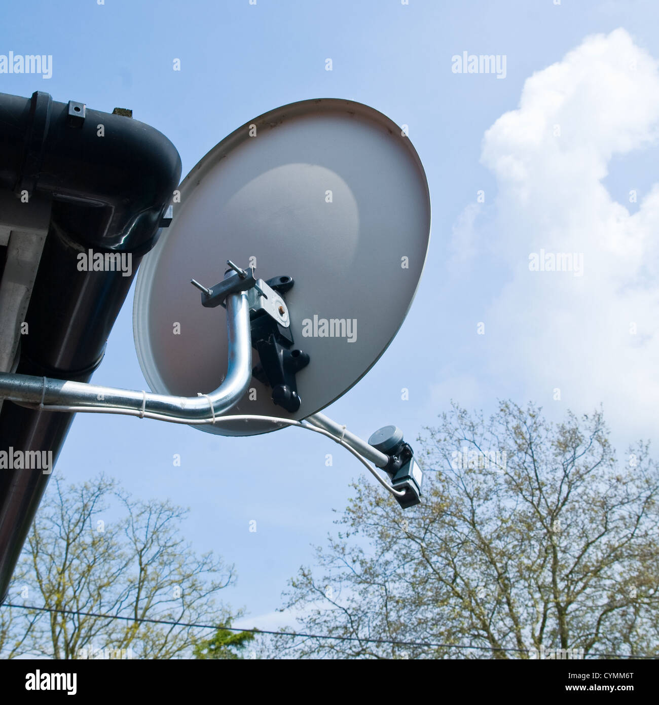 A close up of a round satellite dish and LNB Stock Photo