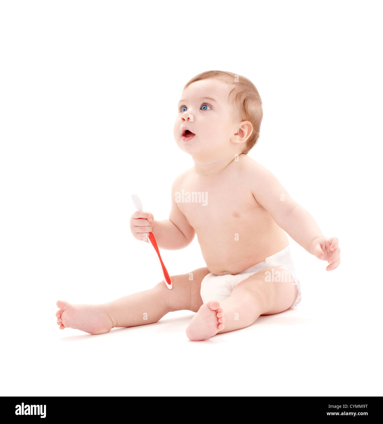 picture of baby boy in diaper with toothbrush Stock Photo Alamy