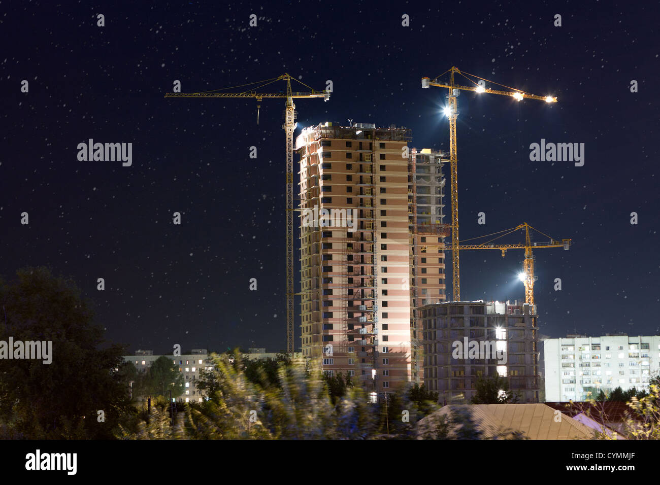 Construction Site at night with construction cranes Stock Photo - Alamy