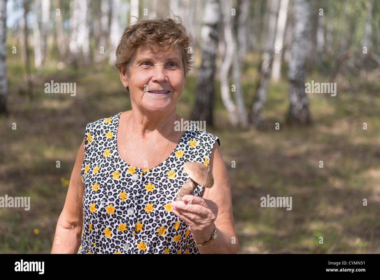 rf Kasimov cheerful woman sunny mashroom elderly Stock Photo