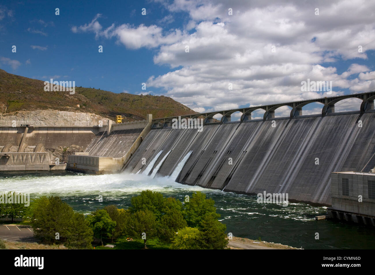 WA05611-00...WASHINGTON - Grand Coulee Dam and three power houses on the Columbia River. Stock Photo