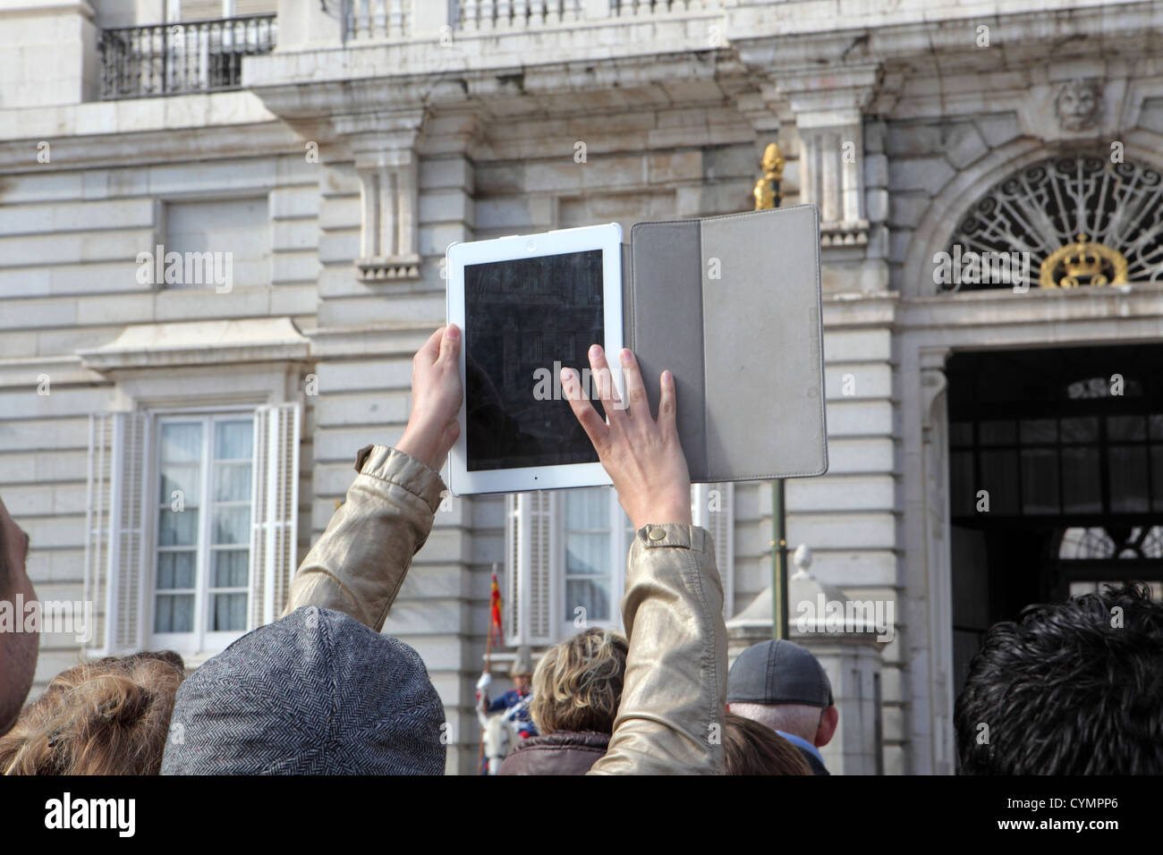 Using an iPad to take photographs, Real Palace, Royal Palace, Madrid, Spain Stock Photo