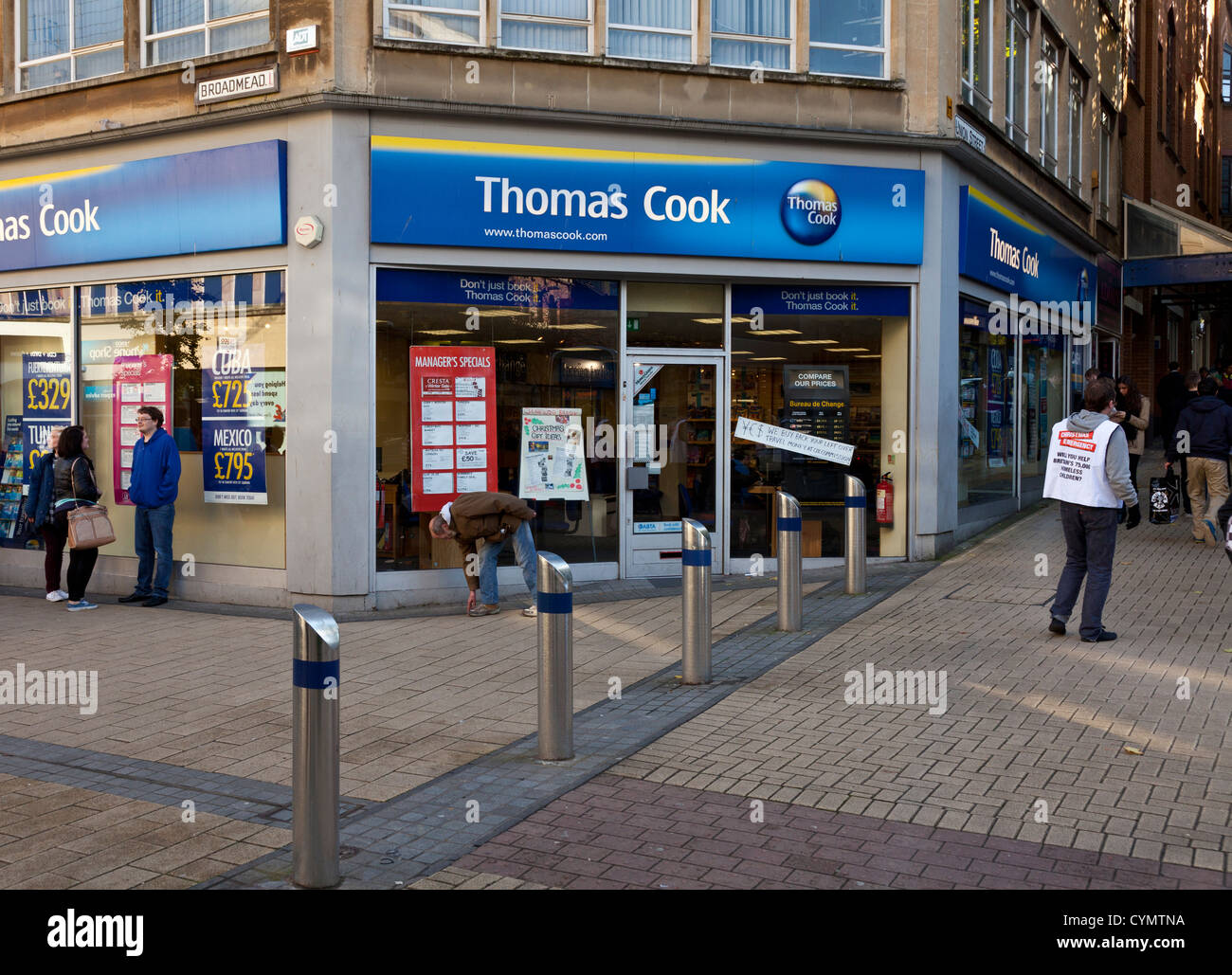 Thomas Cook travel agents and Bureau de change, retail holiday shop store Broadmead, Bristol, England, UK. Stock Photo