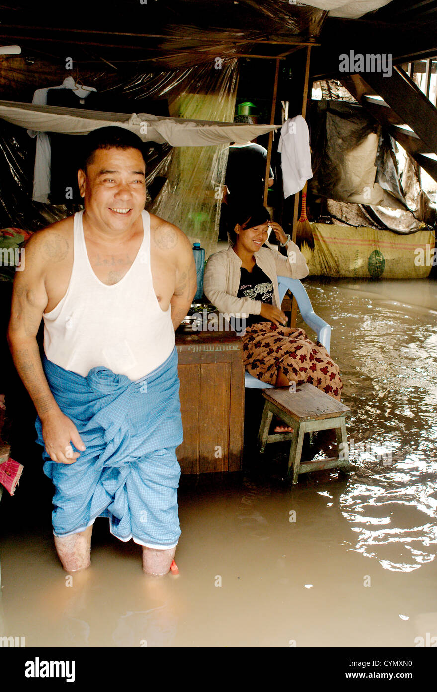 Flooded house at Mandalay during rain season Stock Photo