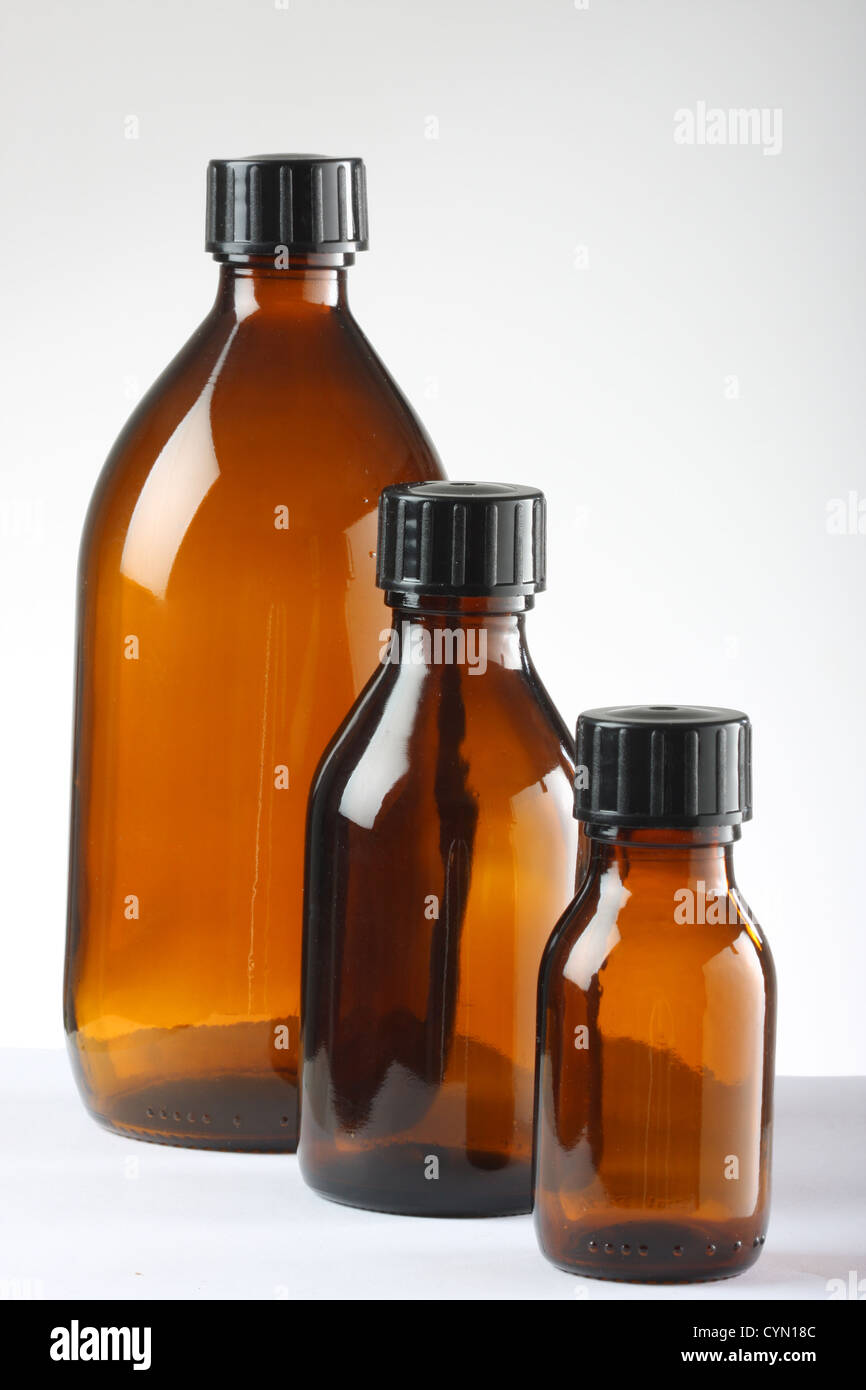 Three brown medicine bottles shot in studio Stock Photo Alamy