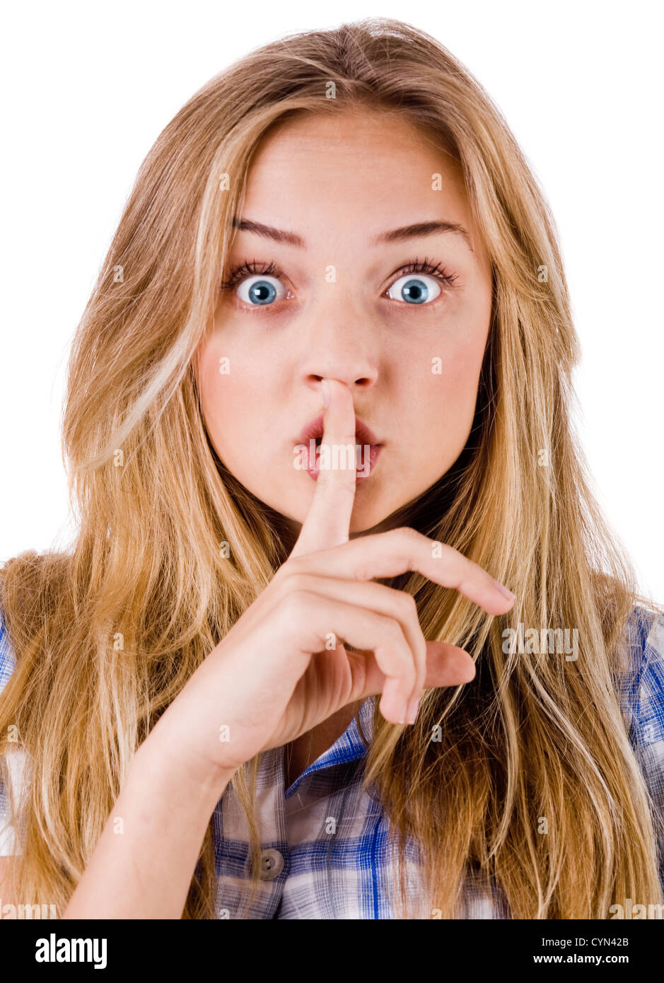 Women says ssshhh to maintain silence on a white background Stock Photo