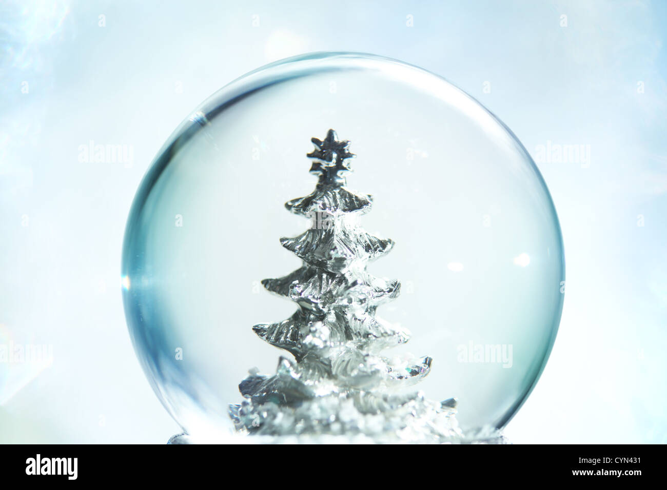 Shiny snow crystal with blue background hi-res stock photography and ...