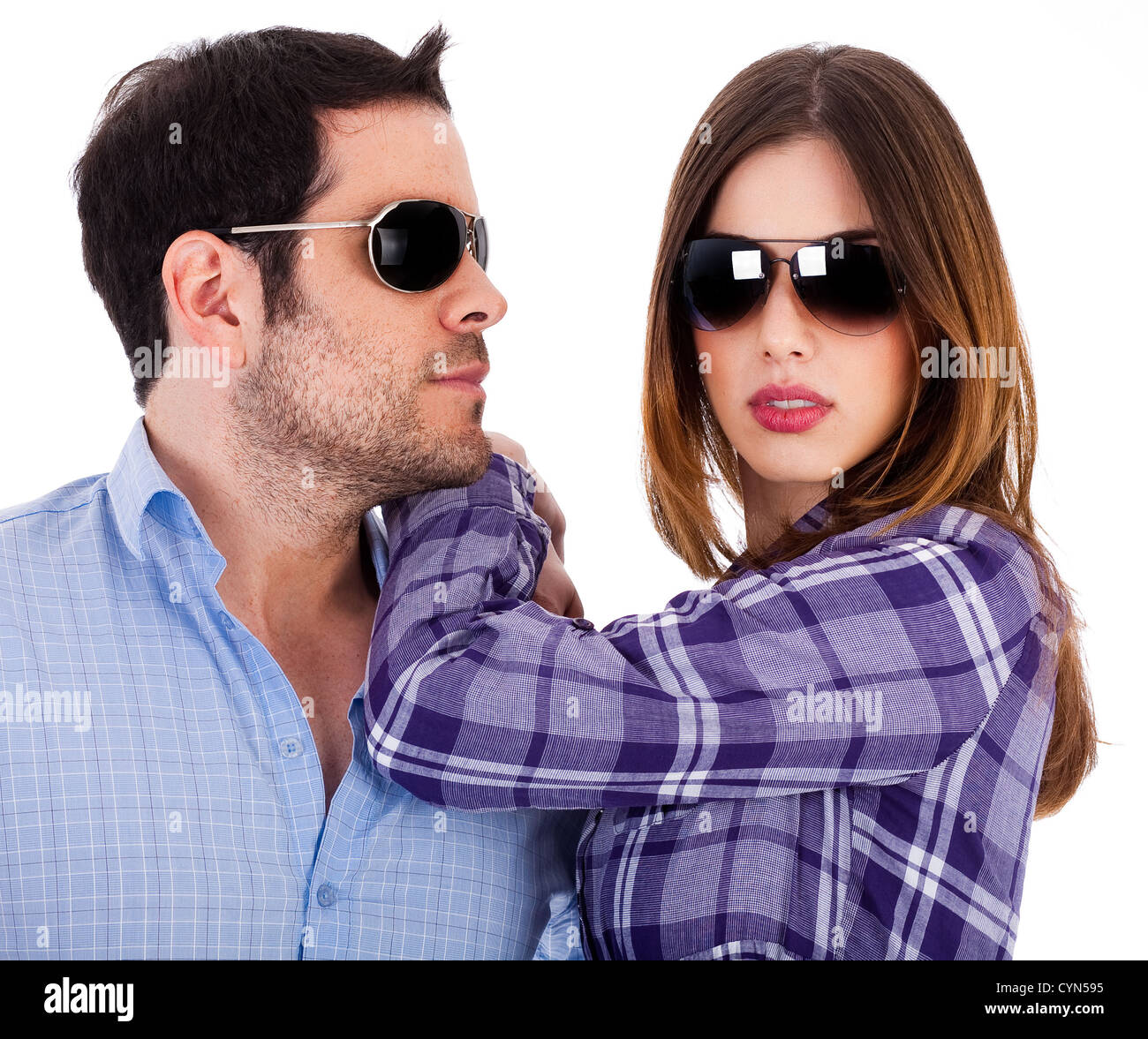 Stylish man and women wearing sunglasses indoor studio Stock Photo Alamy