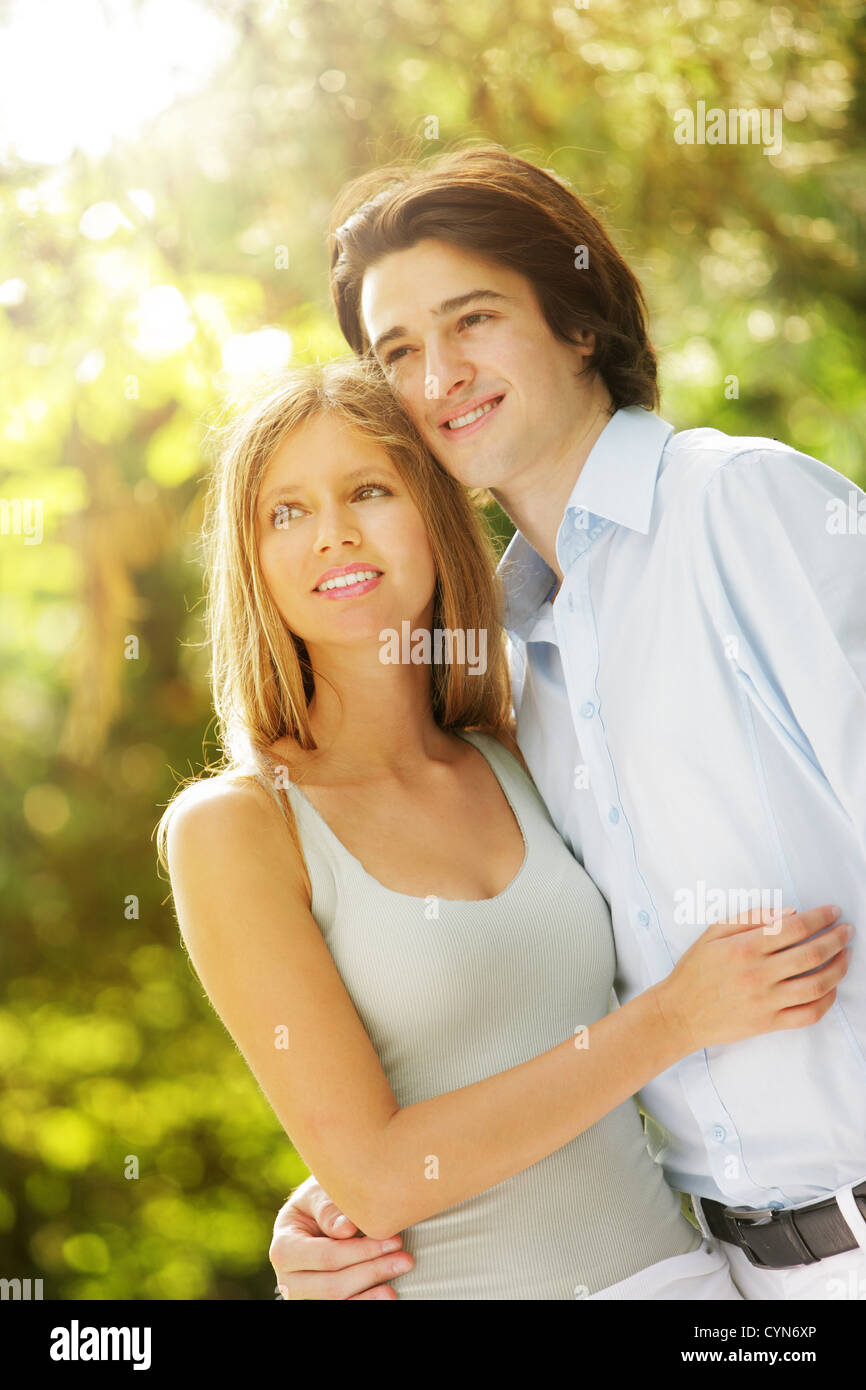 a young couple in love walking in the park Stock Photo - Alamy