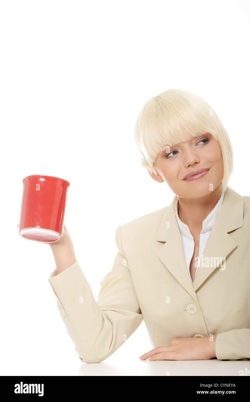 Beautiful businesswoman holding cup of coffee isolated on white ...