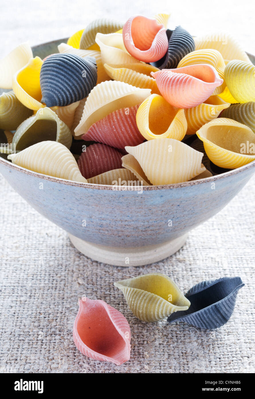 Italian multi colored pasta in bowl Stock Photo