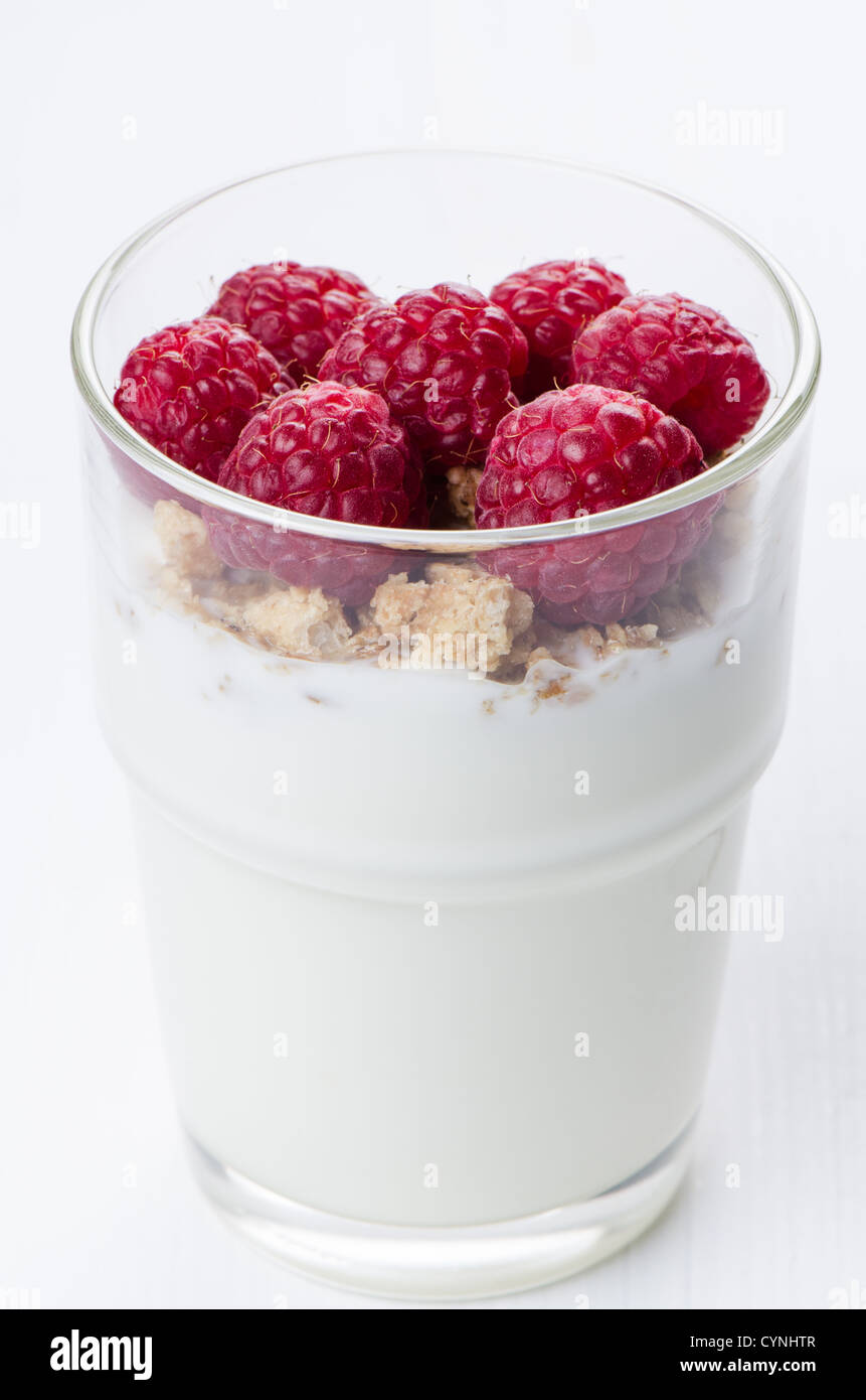 Asas Raspberry Yoghurt Yogurt with raspberries in glass on white Stock Photo - Alamy