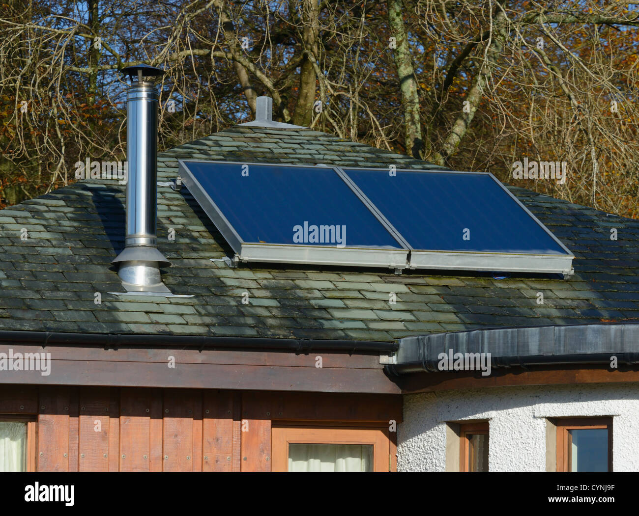 Solar panels on house roof. Hollins Lane,Troutbeck, Lake District National Park, Cumbria, England, United Kingdom, Europe. Stock Photo