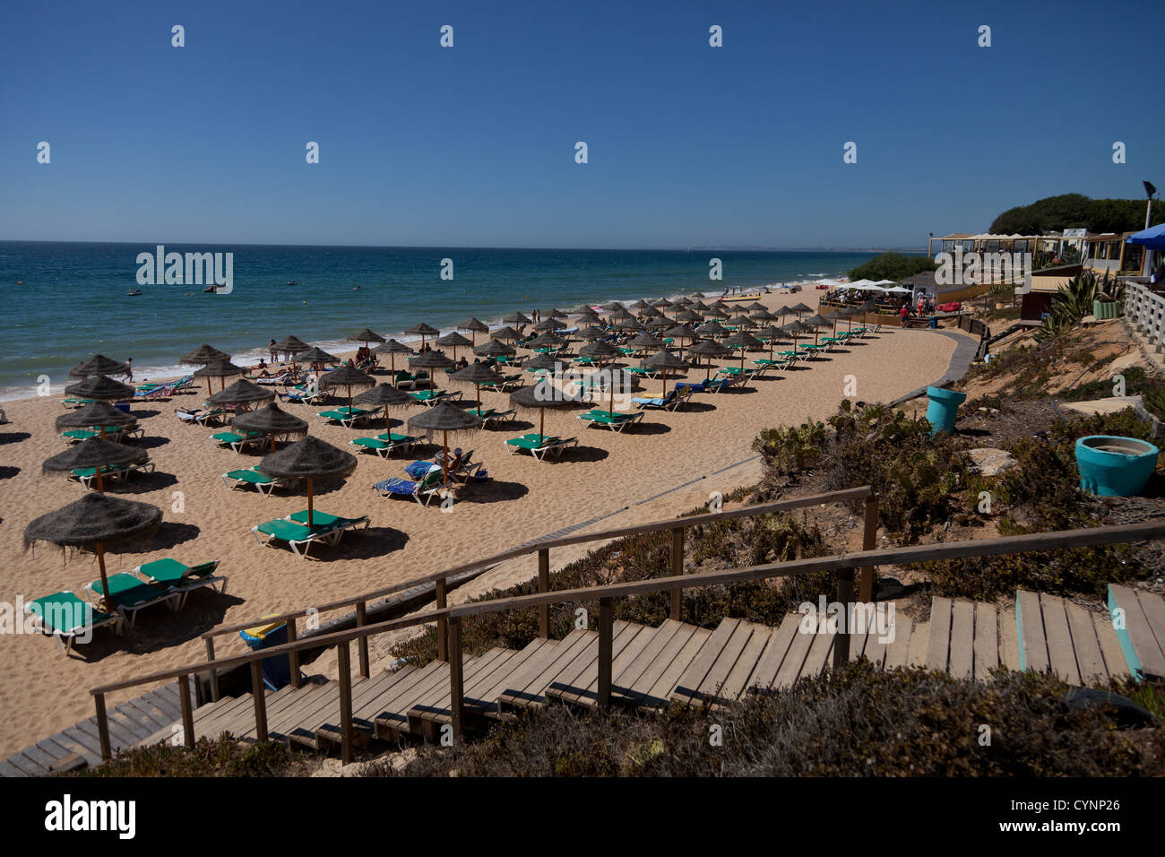 Rows of empty sun loungers at end of season on the Portuguese, Algarve coast Stock Photo