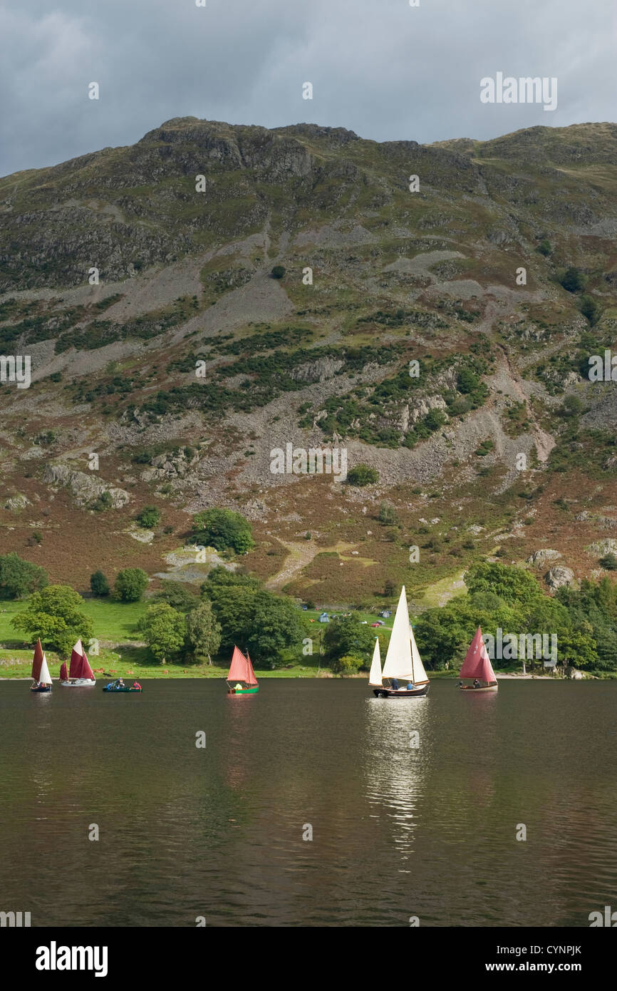 Dinghy sailing on Lake Ullswater in the English Lake District Stock