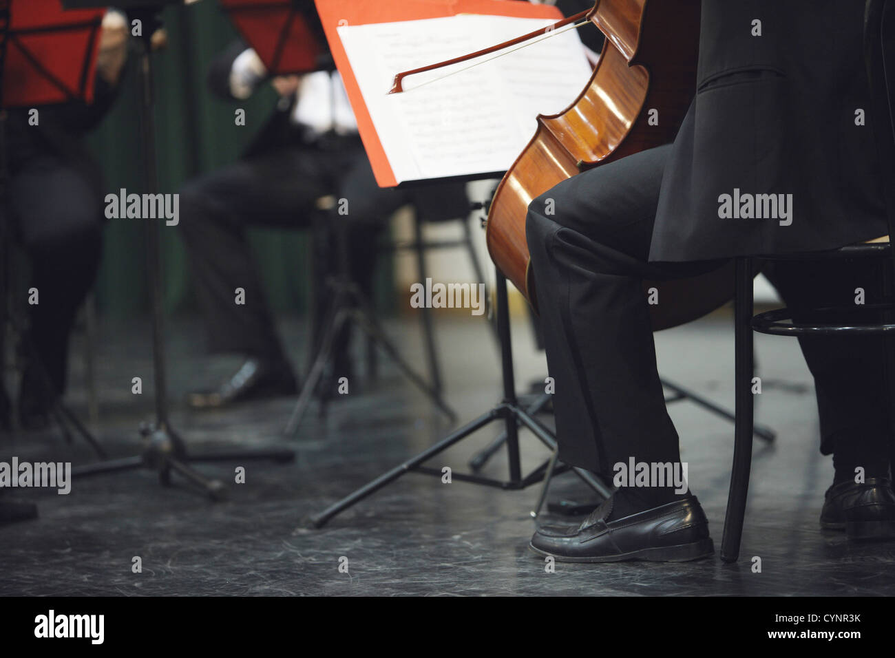 Cello musician at the concert Stock Photo