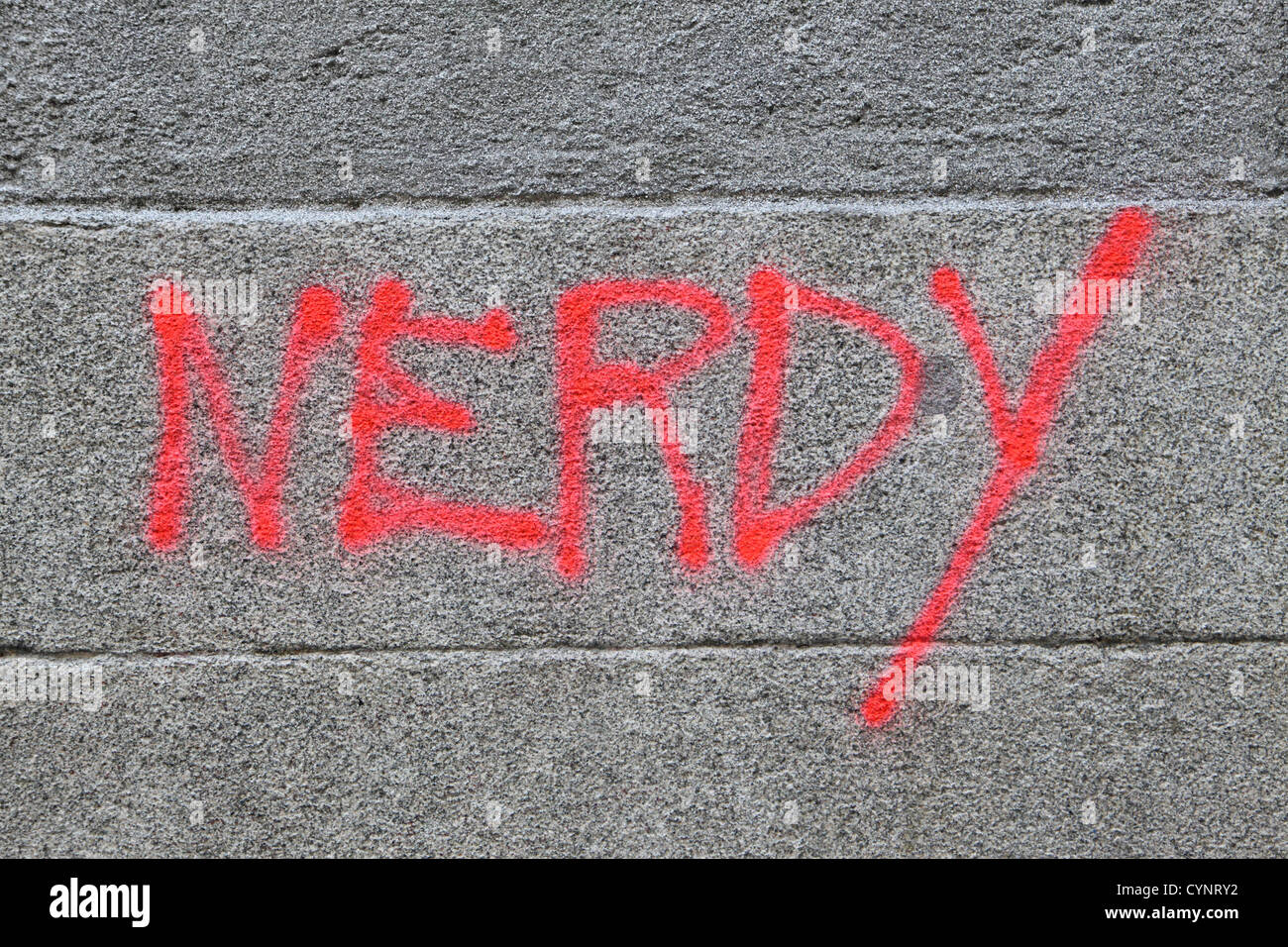 Nerdy - graffiti on wall, red writing, Madrid, Spain, Espana Stock Photo