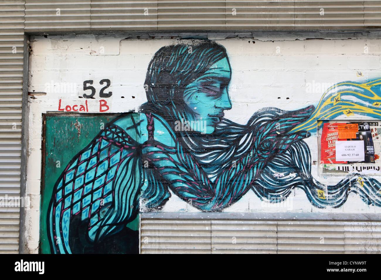 Street art, graffiti, wall painting of woman with long hair, self-expression, Madrid, Spain, Espana Stock Photo