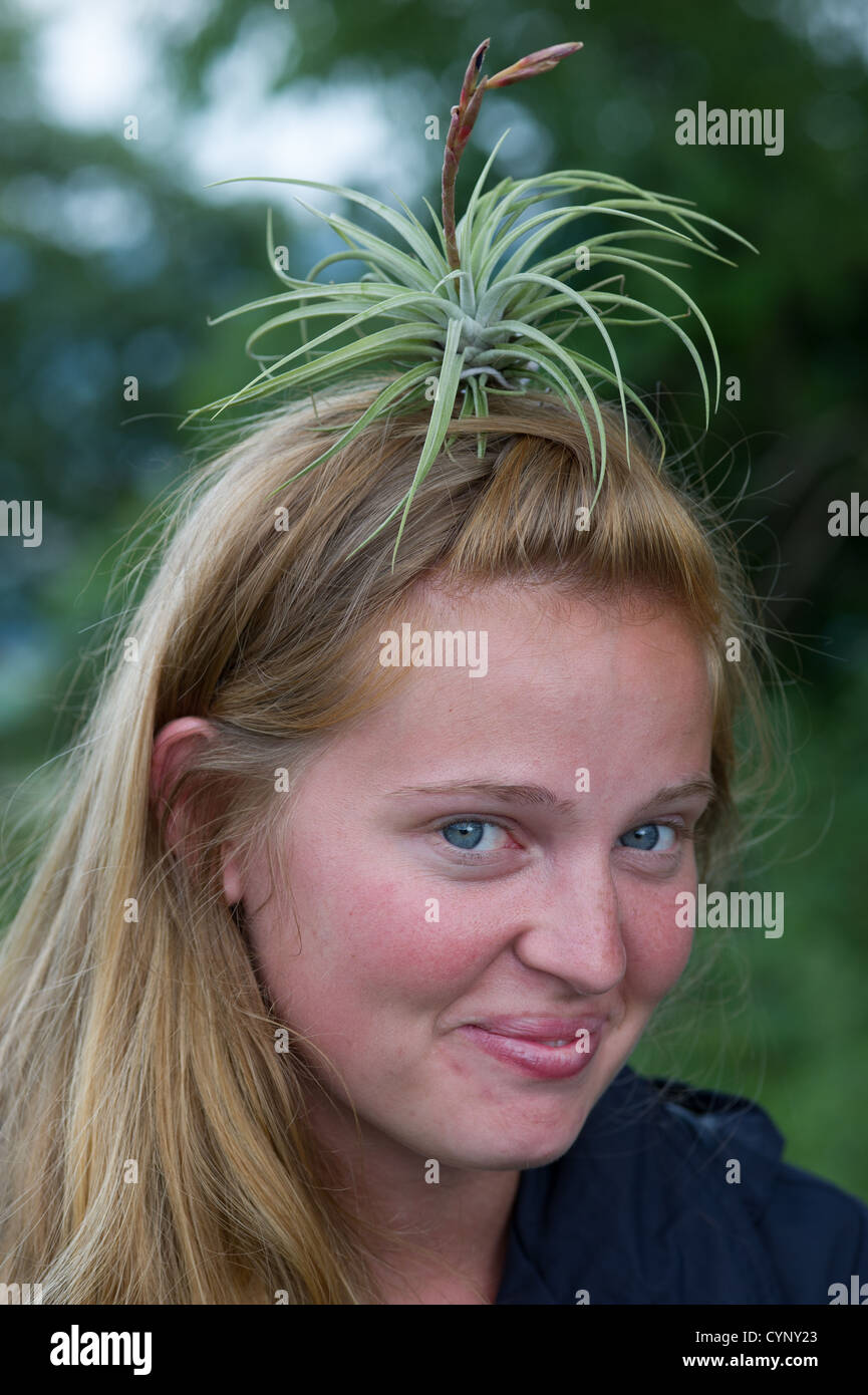 Woman with air plant on head Stock Photo