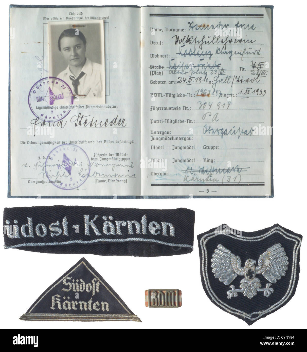 Hitler Youth / League of German Girls,German history,National Socialism,Nazism,historic,historical,League of German Girls service book,bagde,cuff title,eagle emblem for blouse,'Südost Kärnten'(Southeast Carinthia),historic,historical,1930s,1930s,20th century,League of German Girls,Band of German Maidens,youth organization,youth organizations,NS,National Socialism,Nazism,Third Reich,German Reich,Germany,National Socialist,Nazi,Nazi period,utensil,piece of equipment,utensils,object,objects,stills,clipping,clippings,cut out,c,Additional-Rights-Clearences-Not Available Stock Photo