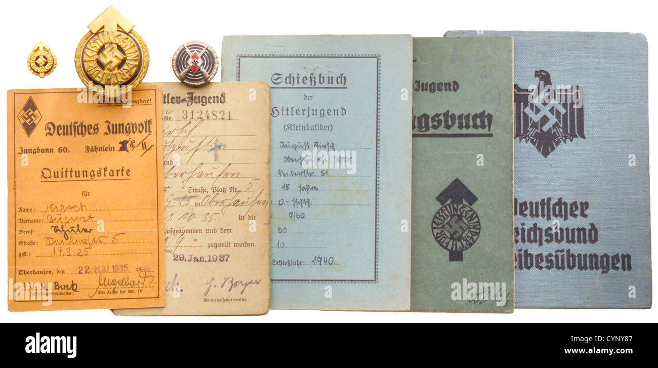 Hitler Youth / League of German Girls,German history,National Socialism,Nazism,historic,hsitorical,several documents from the bequest of the president of the German athletics league,sports badge,marksman badge,proficiency badge in bronze,membership cards,historic,historical,1930s,1930s,20th century,League of German Girls,Band of German Maidens,youth organization,youth organizations,NS,National Socialism,Nazism,Third Reich,German Reich,Germany,National Socialist,Nazi,Nazi period,utensil,piece of equipment,utensils,object,objects,,Additional-Rights-Clearences-Not Available Stock Photo