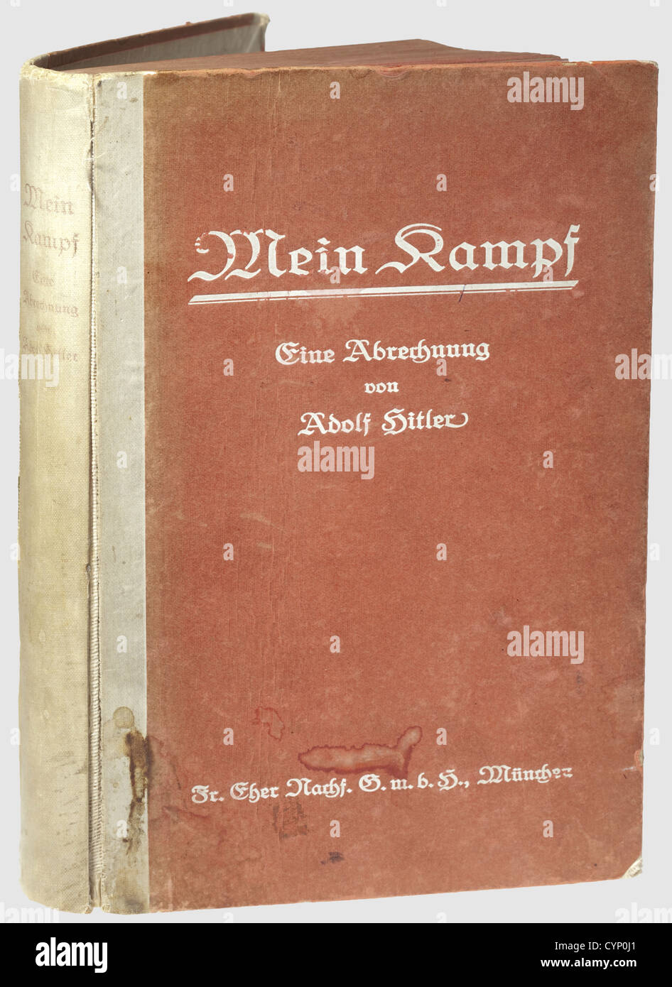 Adolf Hitler - a signed first edition of 'Mein Kampf',vol. 1,1925. The linen-covered spine slightly damaged,the front cover stained. The flyleaf with handwritten ink signature on the upper right 'Adolf Hitler - München den 16/November 1925',underneath the English inscription 'N.B. The signature above is that of Adolf Hitler,Munich 16 Nov. 1925 - Book taken from a killed German soldier whose blood spots the front cover.(P. Hans Dombrowski)' with the signature of Private 'Hugo(???)',historic,historical,1920s,20th century,NS,National Socialism,Nazism,Additional-Rights-Clearences-Not Available Stock Photo