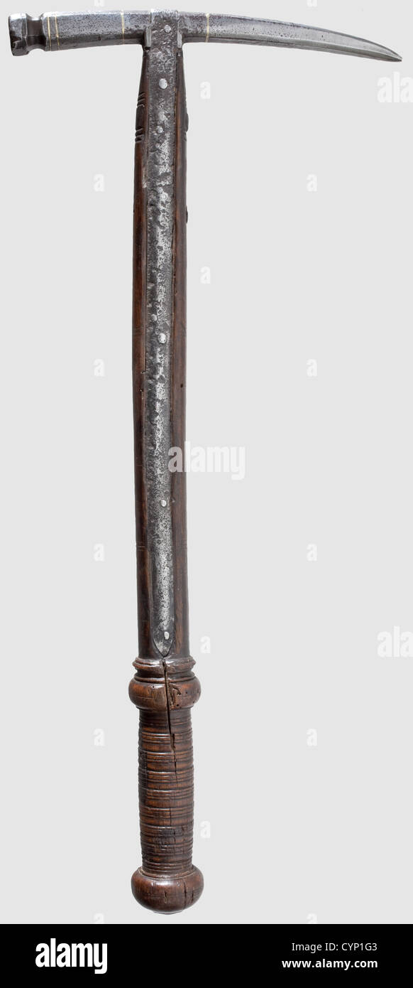 A Hungarian horseman's hammer, circa 1600. Slender fluke of octagonal section with waisted hammerhead on the reverse side, fine silver inlays. Original turned hardwood haft with offset grip and two long side straps. Length 53 cm, historic, historical,, 17th century, axe, ax, axes, ax, tool, tools, military, militaria, fighting device, object, objects, stills, battle ax, battle axe, poleaxe, battle axes, battle axes, poleaxes, clipping, cut out, cut-out, cut-outs, metal, metals, weapon, arms, weapons, arms, ornamented, Additional-Rights-Clearences-Not Available Stock Photo