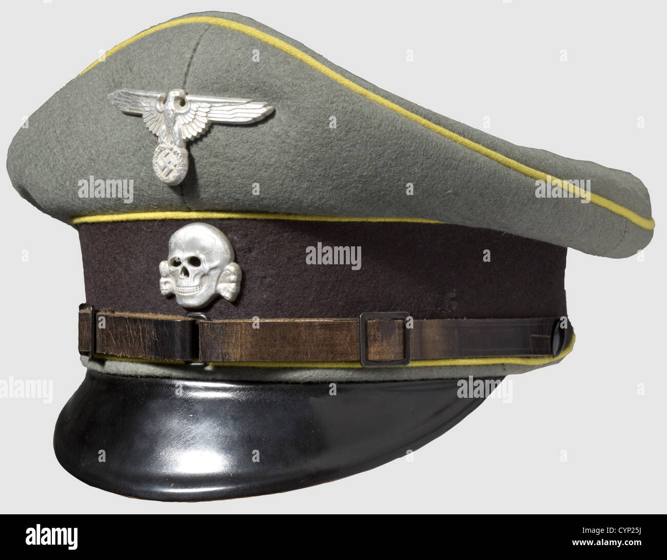 A visor cap for enlisted men/junior officers,of signal detachments. Field grey wool felt with black cap band,citron yellow piping,aluminium insignia and two-piece chin strap. Orange yellow silk cover liner with synthetic label,yellow linen side lining,leather sweat band. Signs of usage,small moth traces,uncleaned. A very rare cap,historic,historical,1930s,1930s,20th century,Waffen-SS,armed division of the SS,armed service,armed services,NS,National Socialism,Nazism,Third Reich,German Reich,Germany,military,militaria,utensil,piece of eq,Additional-Rights-Clearences-Not Available Stock Photo