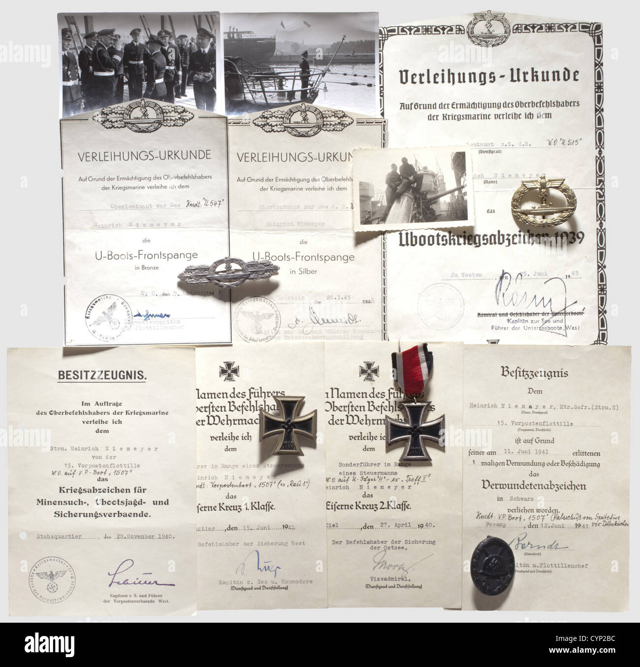Awards and documents of U-Boat Commander Olt.z.S. Heinrich Niemeyer, U-Boat Front Clasp in Silver (corrosion), fine zinc issue by Schwerin, Berlin with award document (trimmed) dated 28 March 1945 as C.O. of 'U-3532', award document (trimmed) for the U-Boat Front clasp in Bronze dated 7 historic, historical, people, 1930s, 20th century, navy, naval forces, military, militaria, branch of service, branches of service, armed forces, armed service, object, objects, stills, clipping, clippings, cut out, cut-out, cut-outs, Additional-Rights-Clearences-Not Available Stock Photo