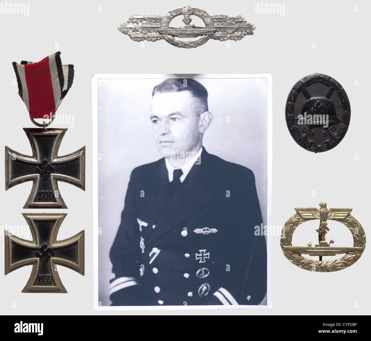 Awards and documents of U-Boat Commander Olt.z.S. Heinrich Niemeyer, U-Boat Front Clasp in Silver (corrosion), fine zinc issue by Schwerin, Berlin with award document (trimmed) dated 28 March 1945 as C.O. of 'U-3532', award document (trimmed) for the U-Boat Front clasp in Bronze dated 7 historic, historical, people, 1930s, 20th century, navy, naval forces, military, militaria, branch of service, branches of service, armed forces, armed service, object, objects, stills, clipping, clippings, cut out, cut-out, cut-outs, man, men, male, Additional-Rights-Clearences-Not Available Stock Photo
