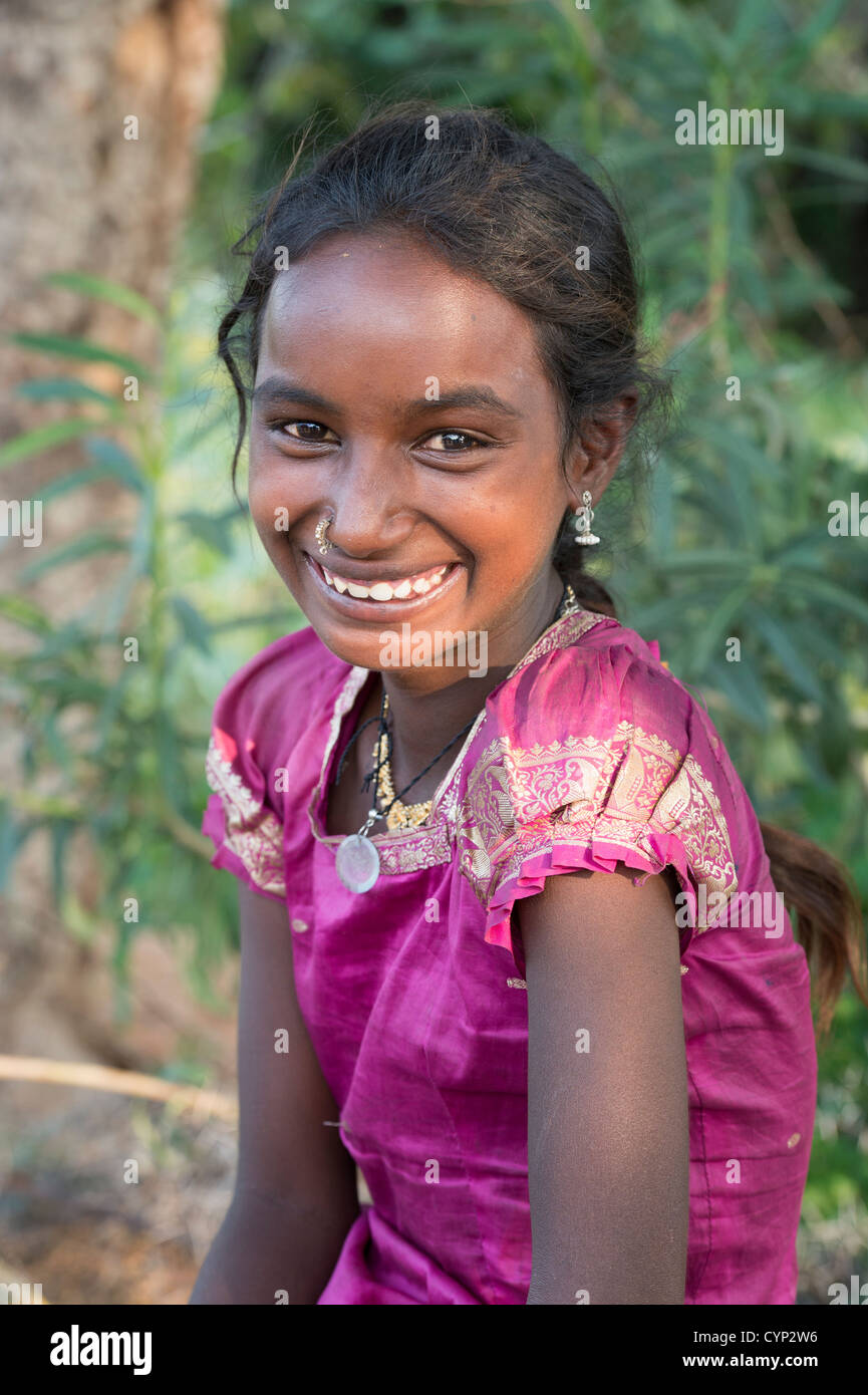 Happy poor lower caste Indian street girl smiling. Andhra Pradesh, India Stock Photo
